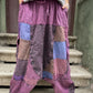 Kadınlar için Nepal patchwork şalvar. Taşlanmış kumaş, bol cep, salaş kesim ve ayarlanabilir bel ile S–XL arası bedenlere uyumlu. Bohem stil ile günlük konfor birleşiyor.