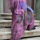 Kadınlar için Nepal patchwork şalvar. Taşlanmış kumaş, bol cep, salaş kesim ve ayarlanabilir bel ile S–XL arası bedenlere uyumlu. Bohem stil ile günlük konfor birleşiyor.