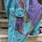 Kadınlar için Nepal patchwork şalvar. Taşlanmış kumaş, bol cep, salaş kesim ve ayarlanabilir bel ile S–XL arası bedenlere uyumlu. Bohem stil ile günlük konfor birleşiyor.